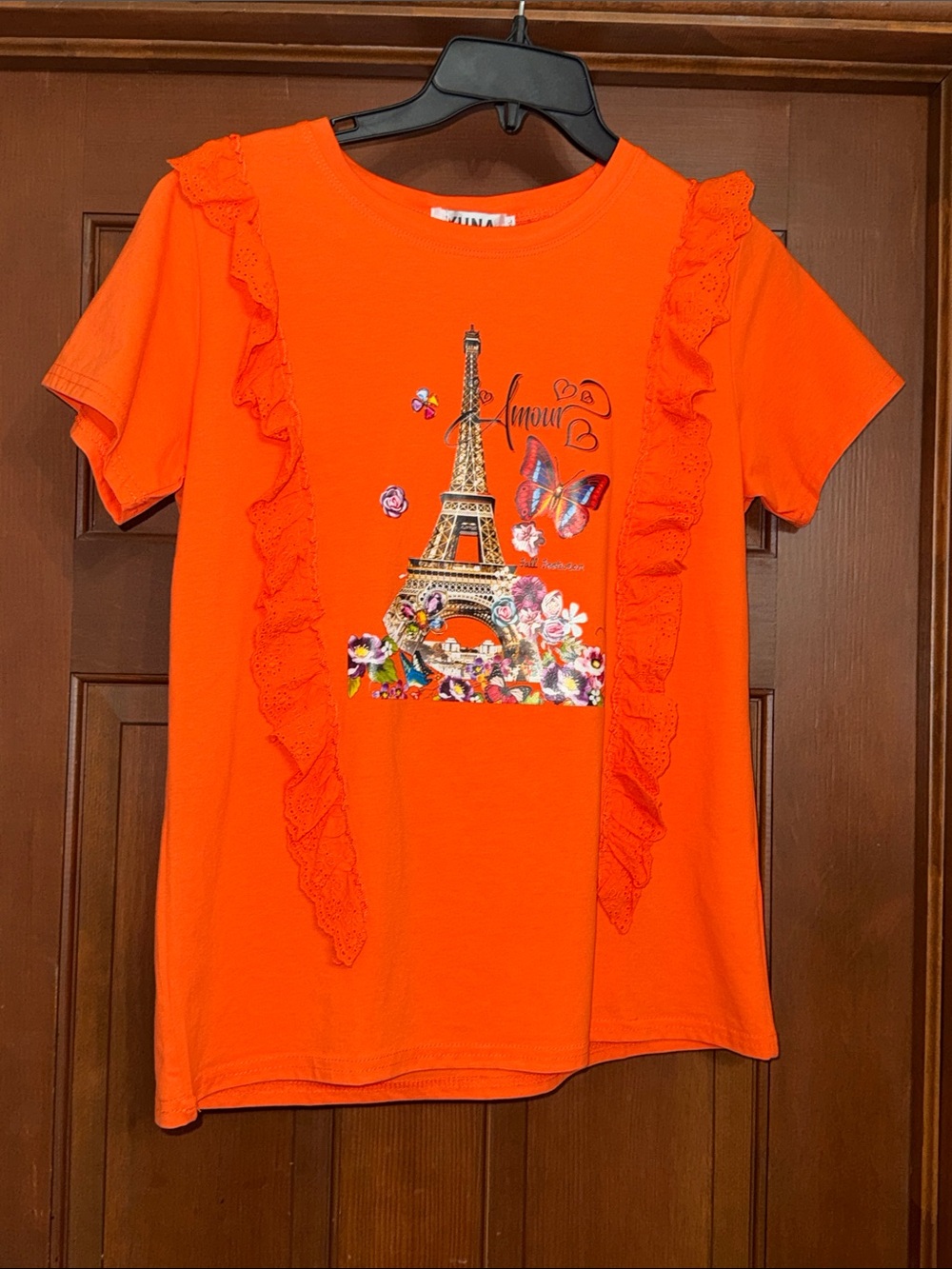 Orange Eiffel Tower Graphic Ruffle Tee